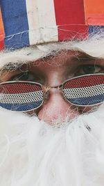 Close-up portrait of man wearing sunglasses