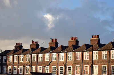 Low angle view of buildings against sky