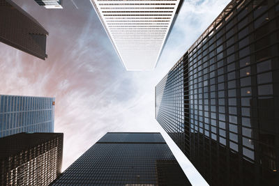 Low angle view of modern buildings against sky