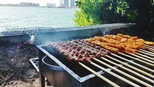 Close-up of meat on barbecue grill