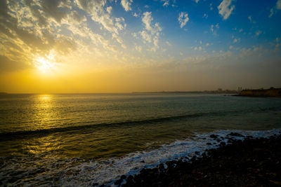 Scenic view of sea against sky during sunset