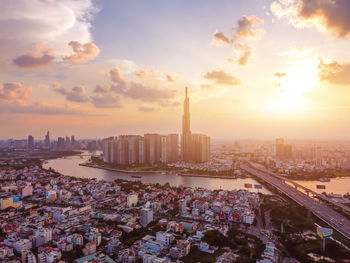 High angle view of city buildings during sunset