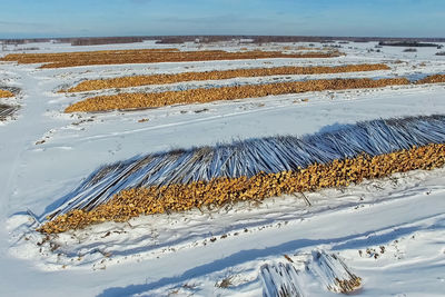 Aerial view of snow covered land