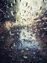 Close-up of water drops on glass