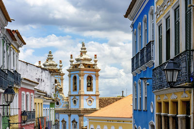 Colorful facades of old houses and historic church in pelourinho neighborhood in salvador, bahia