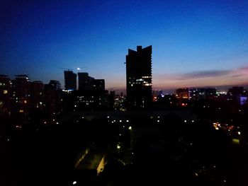 Illuminated cityscape at night