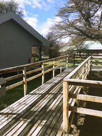 Footbridge against sky