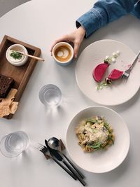 High angle view of breakfast served on table