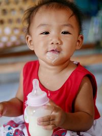 Portrait of cute baby at home