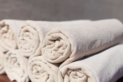 Close-up of rolled towels