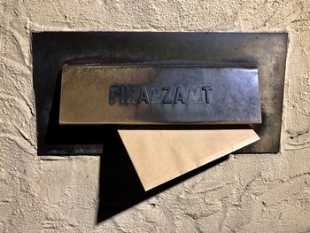 Close-up of text on wall