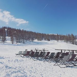 Scenic view of snow covered landscape against sky