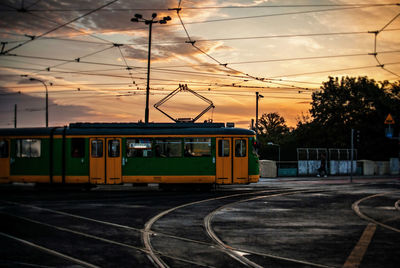 Cable car on tracks at sunset