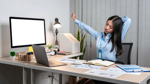 Woman working on table