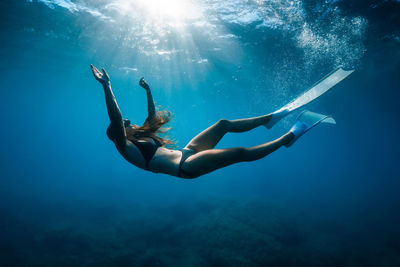 Man swimming in sea