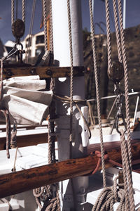 Close-up of rope tied to bollard