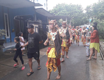 People walking on street in city