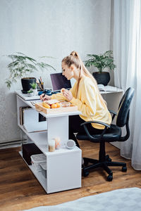 Flexible working, flexible work. young woman freelancer working at home office with laptop and