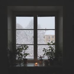 Close-up of sea seen through window