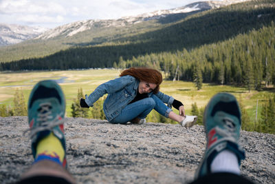 Low section of man and woman on mountain
