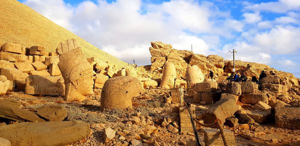 Panoramic view of rocks against sky