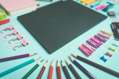 Multi colored objects arranged on table