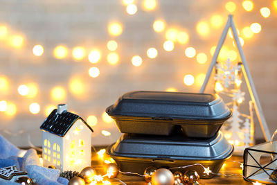 Close-up of illuminated christmas lights on table