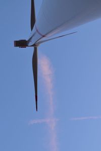 Low angle view of airplane flying in sky