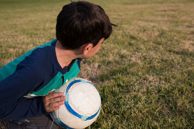 High angle view of boy on field