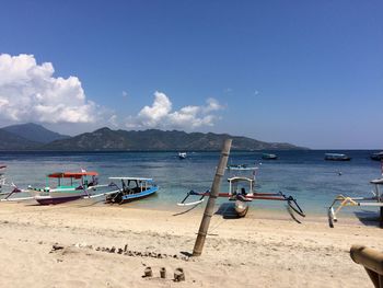 Scenic view of sea against blue sky