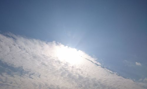 Sun shining through clouds