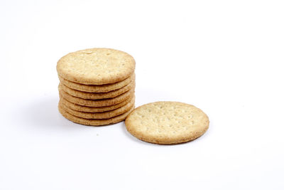 Stack of cookies against white background