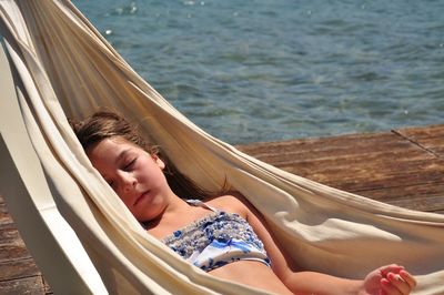 Girl sleeping in hammock