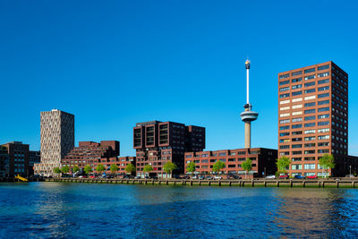 Rotterdam cityscape with euromast and nieuwe maas river