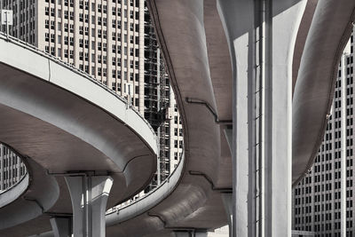 Low angle view of bridge in city