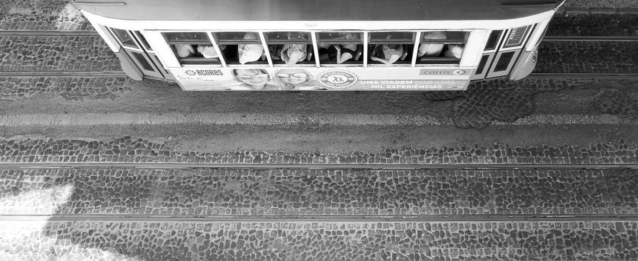 architecture, built structure, steps, steps and staircases, railing, staircase, metal, transportation, building exterior, low angle view, wall - building feature, day, no people, pattern, building, graffiti, rail transportation, high angle view, outdoors, metallic