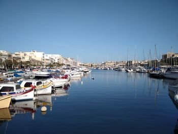 Boats moored in harbor