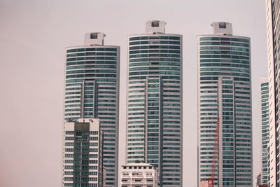 Low angle view of modern buildings in city