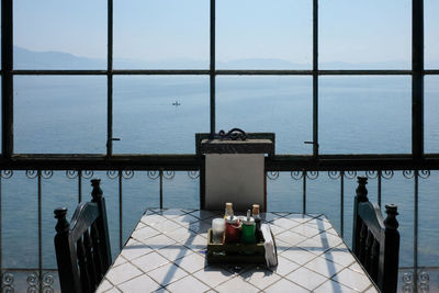 High angle view of table by sea against sky