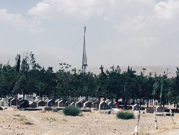 Panoramic view of cemetery against sky