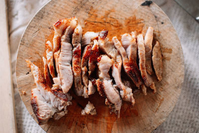 Close-up of meat on cutting board