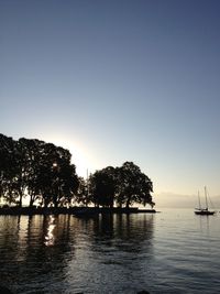 Scenic view of calm sea against clear sky