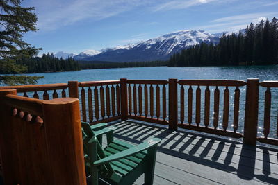 Scenic view of sea and mountains against sky