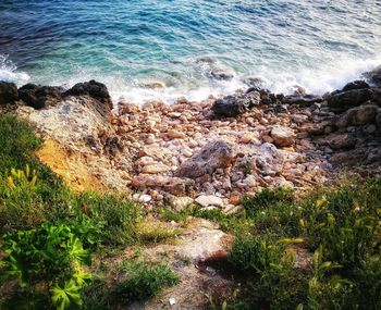 High angle view of rocks on beach