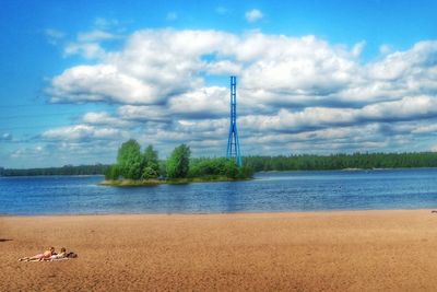 Scenic view of sea against cloudy sky