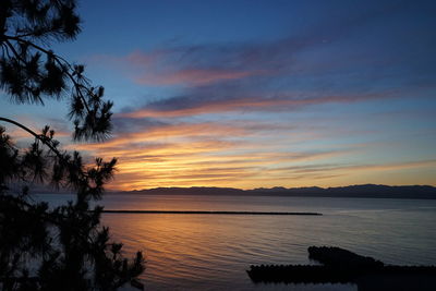 View of calm sea at sunset