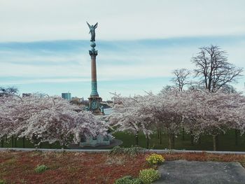 Low angle view of statue against sky