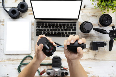 Directly above view of man using mobile phone