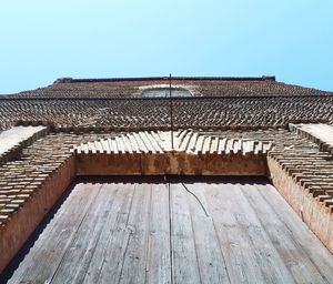 Roof of building against clear sky