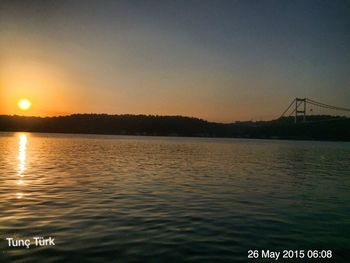 Scenic view of sea at sunset